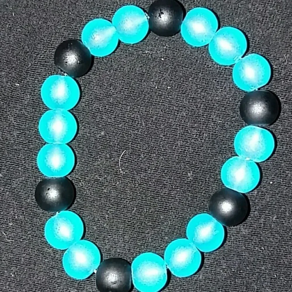 Baby blue and black beaded bracelet